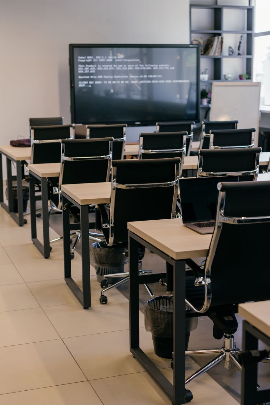 Modern conference room with presentation screens